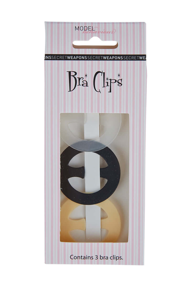 a packaging of bra clips from secret weapons that comes in 3 clips in clear color, black, and nude, designed to give you comfort and confidence with your bra sctraps from slippage and showing