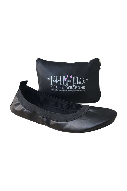 A pair of black Foldable Ballet Flats with a purse carrying the fold up shoes against a white background