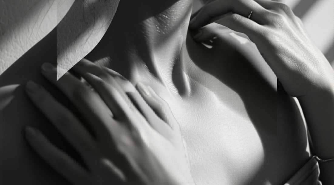 Black and white editorial photograph of skincare oils and a soft cloth on linen, classic monochrome lifestyle imagery.