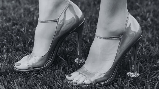 Silver high-heeled shoes on grass with high heel protectors from secret weapons, makes you comfortable to walk in every step especially in a grass surface