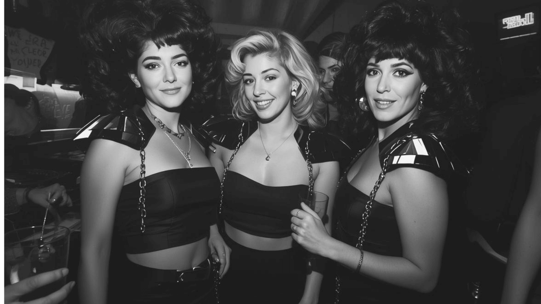 Three women wearing black crop tops at an event, styled with a smooth, strapless finish for a confident, no bra look