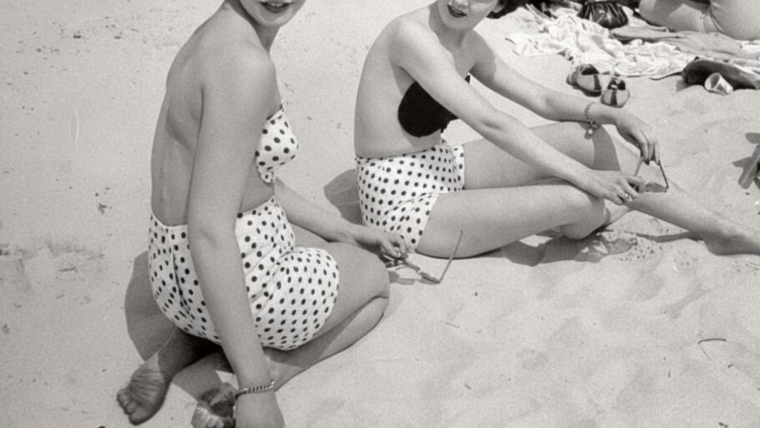 women wearing adhesive bras wearing polka dots shorts
