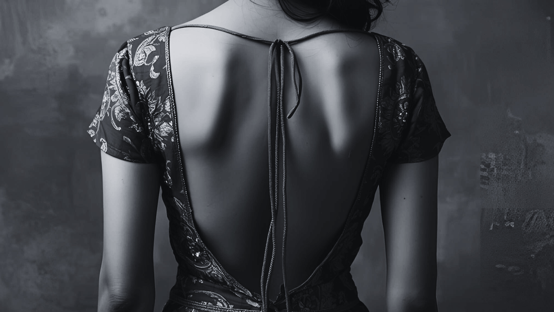 a woman wearing a low back strap from secret weapons, revealing her back confidently