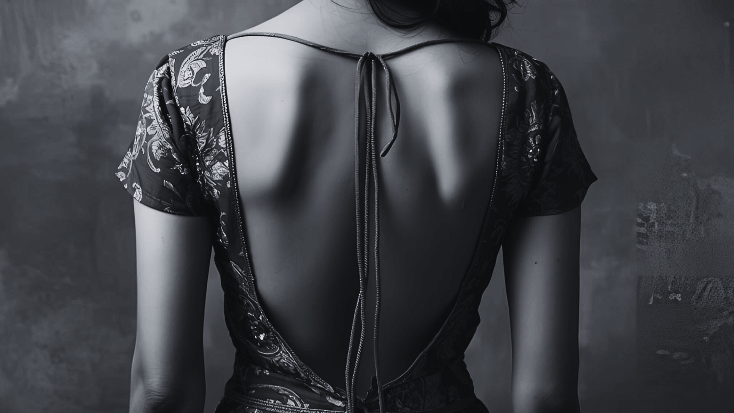 a woman wearing a low back strap from secret weapons, revealing her back confidently