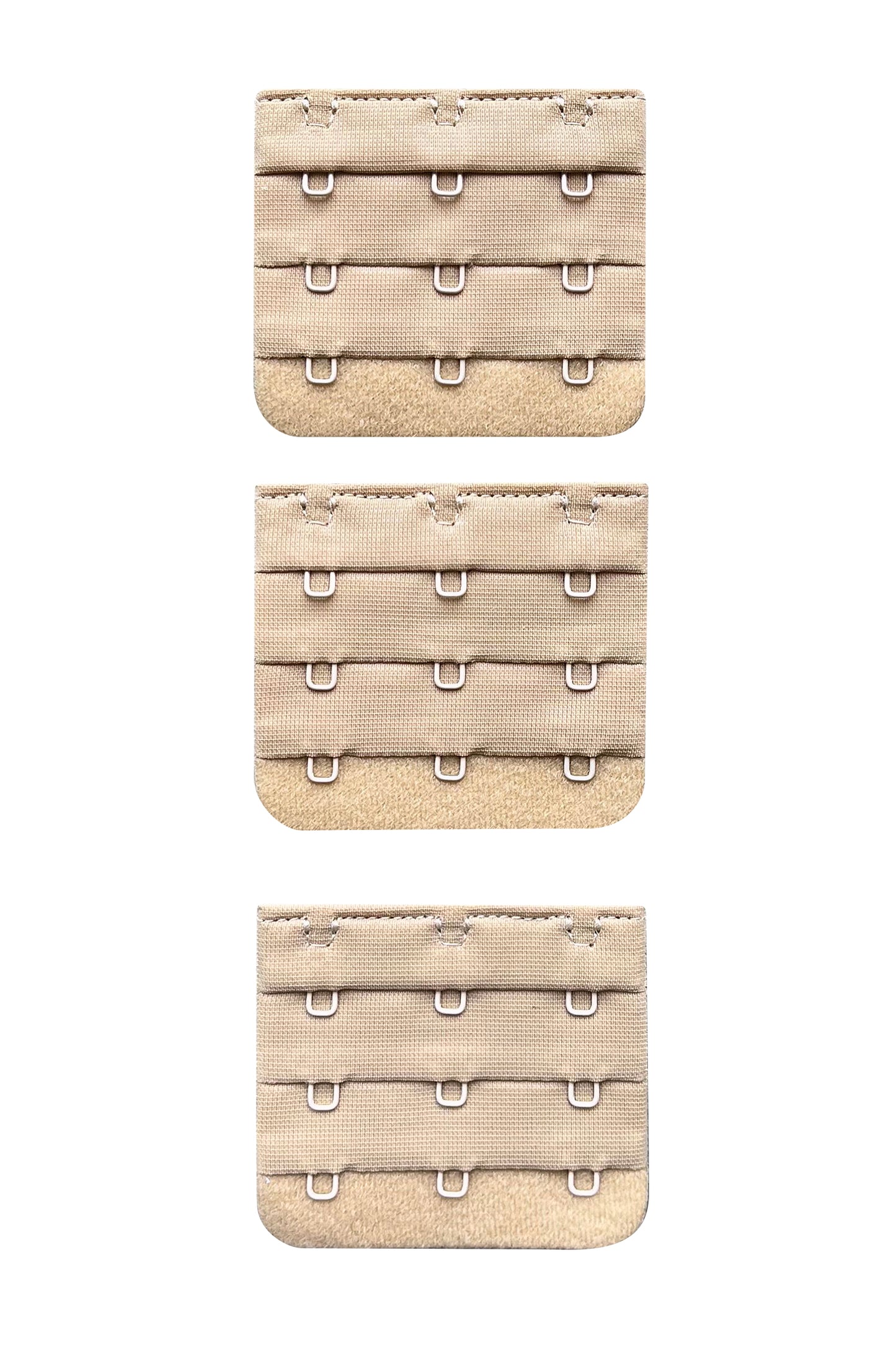 A set of 3 x 3 hook nude/beige skin tone colour bra strap extenders ona white background