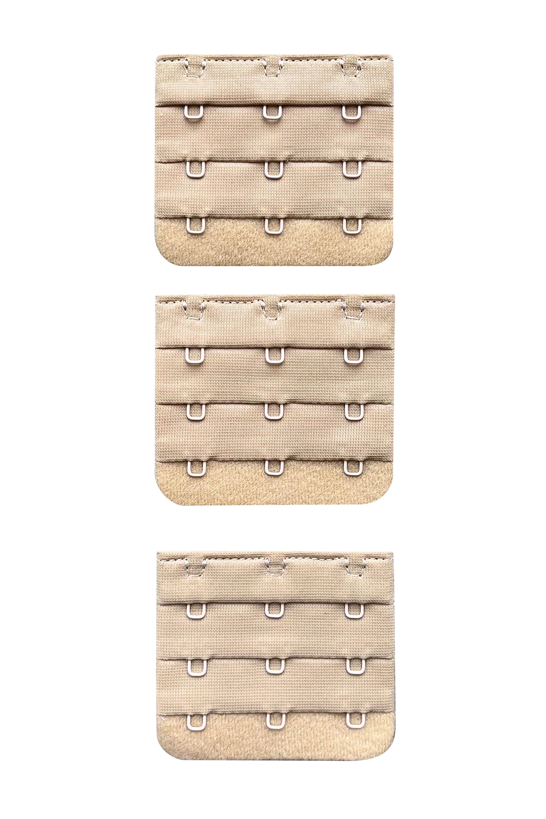 A set of 3 x 3 hook nude/beige skin tone colour bra strap extenders ona white background