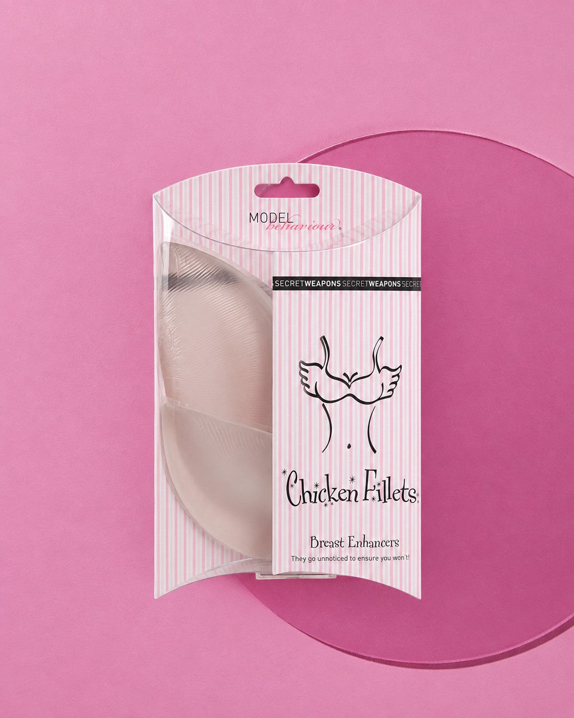 Chicken Fillets Ba Inserts in their Secret Waepons brand pink packaging on a drak pink background  