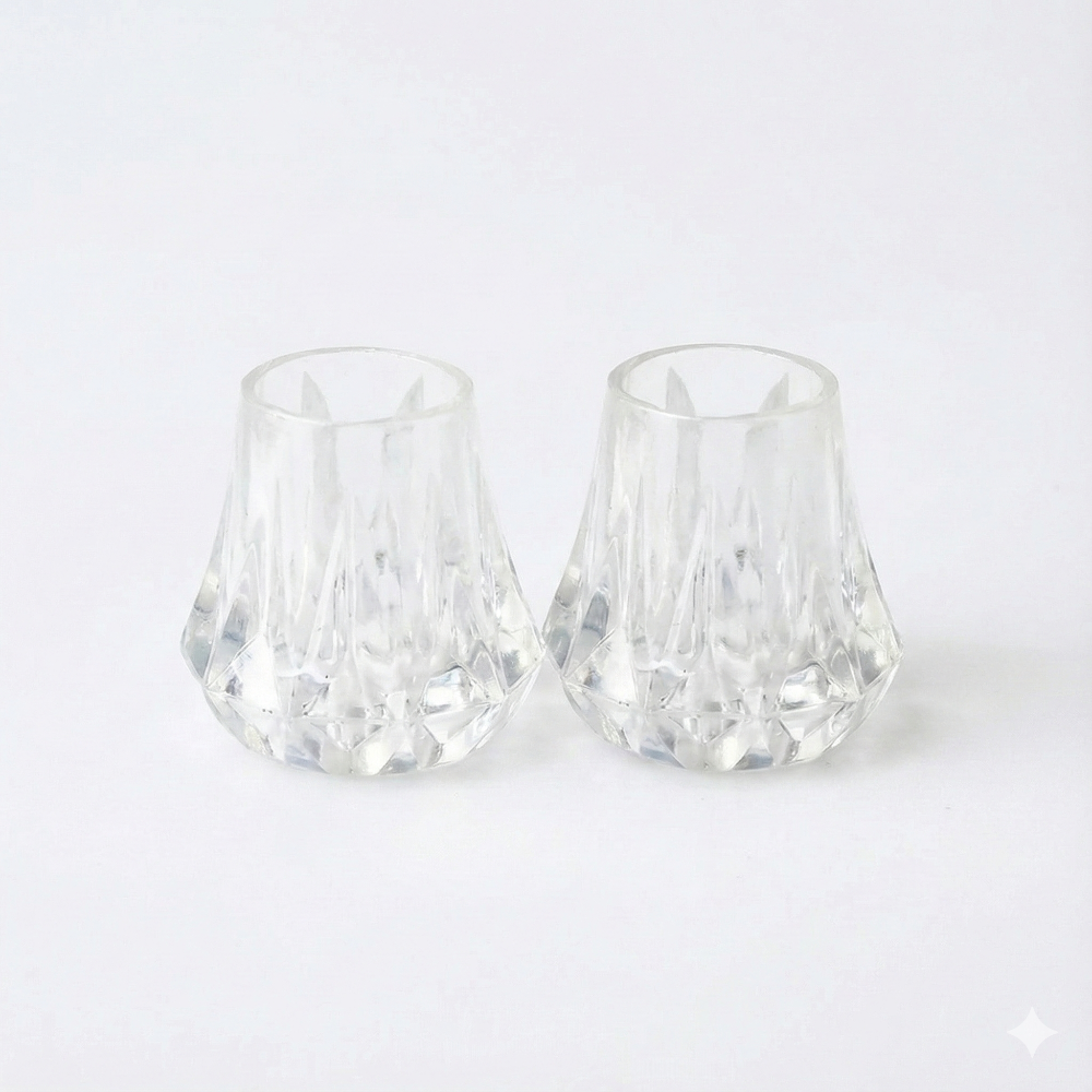 two clear stilletto stoppers for walking on grass, mud or when you need to proect your wooden floors from heels