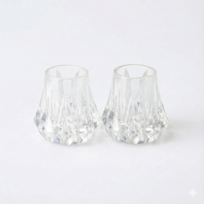 two clear stilletto stoppers for walking on grass, mud or when you need to proect your wooden floors from heels