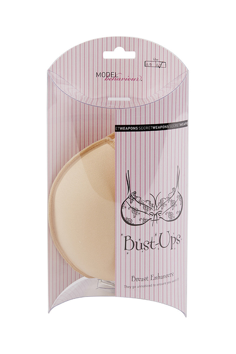 Image of a pair of Bust Ups Breast Enhancing Bra Inserts in blister packaging
