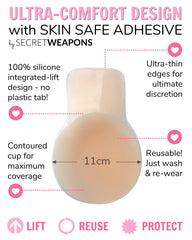 Silicone adhesive cup enhances breast lift with ultra-thin edges for discreet wear, measuring 11cm. It's reusable, contoured for coverage, and designed by Secret Weapons. Text highlights skin-safe adhesive and features.