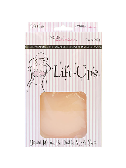 Packaging showcases breast lifting reusable nipple covers. Text on striped background reads: "Lift-Ups by Model Behaviour, Size A-D Cup, SECRET WEAPONS, Breast Lifting Re-Usable Nipple Covers."