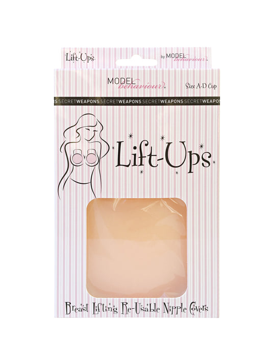 Packaging showcases breast lifting reusable nipple covers. Text on striped background reads: "Lift-Ups by Model Behaviour, Size A-D Cup, SECRET WEAPONS, Breast Lifting Re-Usable Nipple Covers."