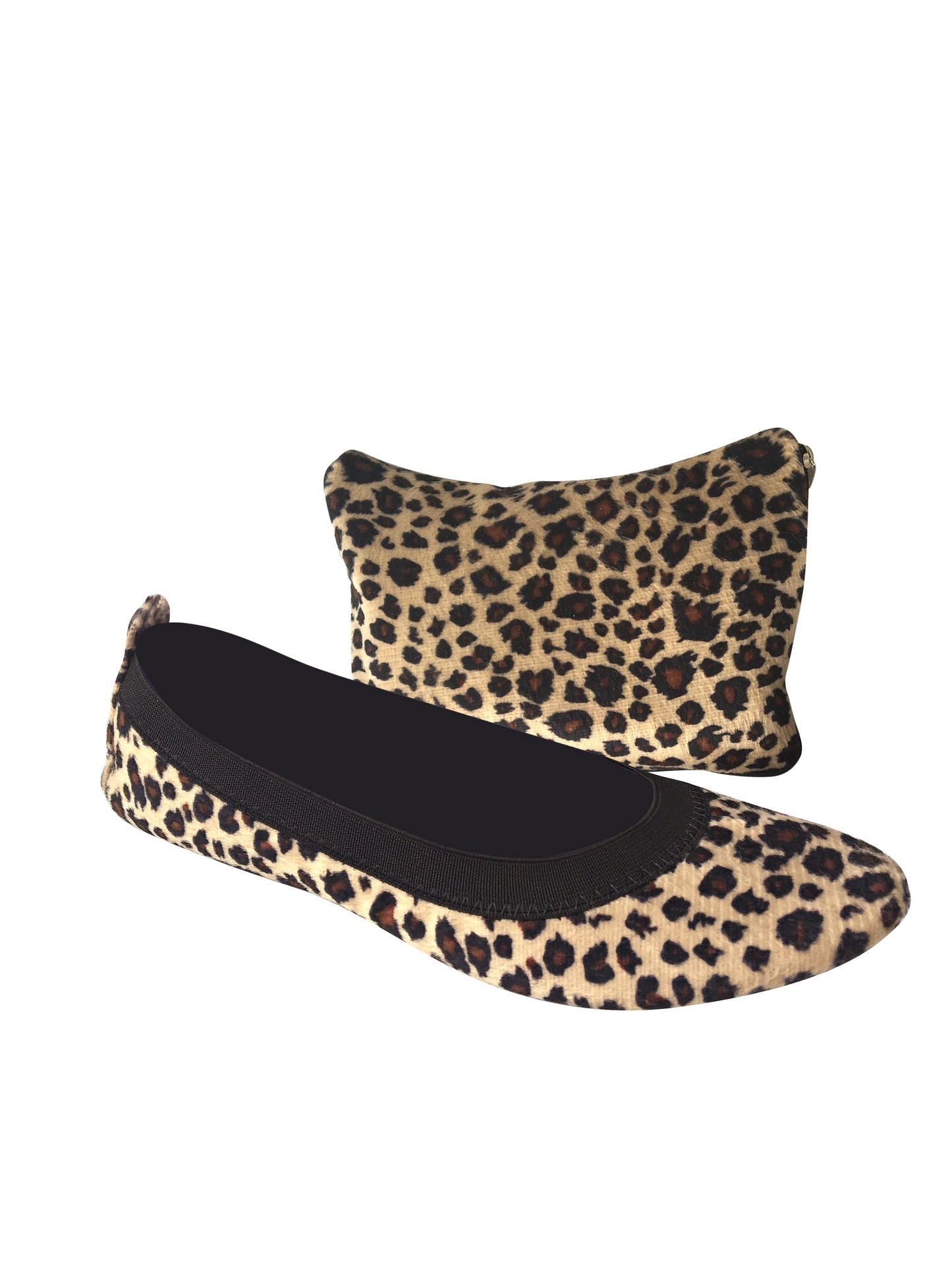 Leopard colour foldable ballets flat shoes sitting in front of the carry purse against a white background.