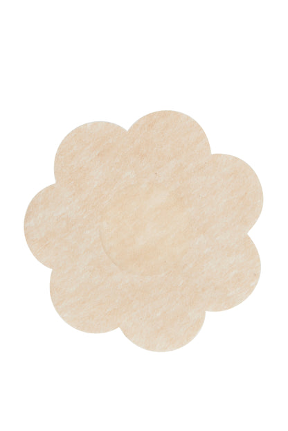 A beige flower-shaped sticker rests on a plain white background. The sticker features a textured surface with a subtle, natural pattern.