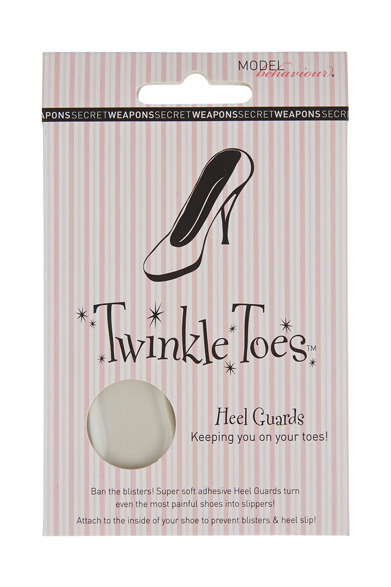 Package of "Twinkle Toes" heel guards featuring a high-heel illustration, set against a pink-striped background. Text reads: "Keeping you on your toes! Ban the blisters! Super soft adhesive Heel Guards turn even the most painful shoes into slippers! Attach to the inside of your shoe to prevent blisters & heel slip!"