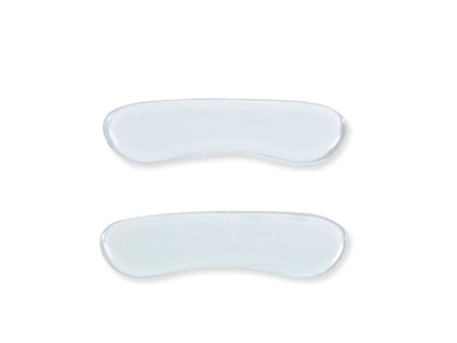 Two translucent, curved gel patches are positioned parallel to each other against a plain white background.