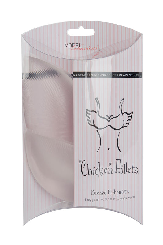 Breast enhancers packaged in a clear, striped box with text: "MODEL behaviour" and "Secret Weapons." Illustration depicts a bust with wings. Text reads: "Chicken Fillets Breast Enhancers. They go unnoticed to ensure you won't!"